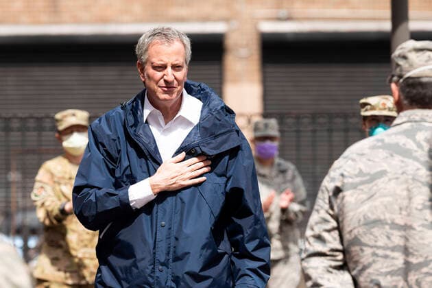 April 8, 2020, Bronx, NY, U.S: April 8, 2020 - Bronx, NY, United States: New York City Mayor BILL DE BLASIO (D) welcoming members of the United States Air Force who have been deployed to Lincoln Hospital. The mayor is seen here in a courtyard of Lincoln Hospital with U.S. Air Force personnel. Bronx U.S. - ZUMAb161 20200408_zap_b161_018 Copyright: xMichaelxBrochsteinx