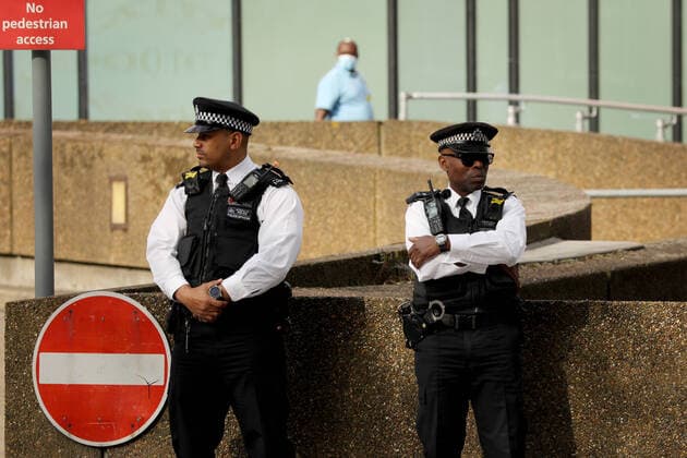 (200409) -- LONDON, April 9, 2020 (Xinhua) -- Police stand guard St Thomas Hospital where British Prime Minister Boris Johnson remains in intensive care in London, Britain on April 8, 2020. During Wednesday s Downing Street daily press briefing, Chancellor of the Exchequer Rishi Sunak said Prime Minister Boris Johnson s condition is improving and remains in intensive care. Johnson was admitted to St Thomas Hospital in London with persistent symptoms on Sunday night, 10 days after testing positive for COVID-19. He was moved into intensive care on Monday night after his coronavirus symptoms worsened. (Photo by Tim Ireland Xinhua) UK-LONDON-COVID-19-PM-SITUATION 