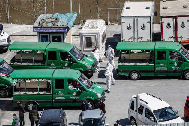 (200409) -- ISTANBUL, April 9, 2020 -- Staff members prepare to transport coffins of people who died of COVID-19 to a burial ground in Istanbul, Turkey, April 8, 2020. Turkish Health Minister Fahrettin Koca on Wednesday confirmed 4,117 new COVID-19 cases and 87 more deaths from the virus in Turkey. The total number of confirmed COVID-19 cases in Turkey rose to 38,226, while the death toll surged to 812, Koca tweeted. TURKEY-ISTANBUL-COVID-19 XuxSuhui 