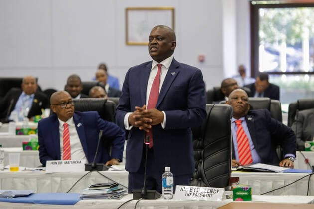 (200409) -- GABORONE, April 9, 2020 (Xinhua) -- Botswanan president Mokgweetsi Masisi(C) addresses a COVID-19 special parliamentary meeting in Gaborone, Botswana, April 8, 2020. Botswanan president Mokgweetsi Masisi on Wednesday said he wants to enact a six-month state of emergency for outward motives when addressing a COVID-19 special parliamentary meeting in Gaborone. (Photo by Tshekiso Tebalo Xinhua) BOTSWANA-GABORONE-PRESIDENT-COVID-19-STATE OF EMERGENCY 