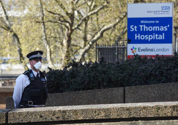 . 09 04 2020. London, United Kingdom. Coronavirus crisis. Police officers seen outside St Thomas Hospital (London), where Prime Minister Boris Johnson is getting better in intensive care. The coronavirus lockdown continues and it probably will be extended for weeks, despite the severe blow to the economy. In this sense the Bank of England has announced it will finance UK Government coronavirus crisis extra spending.  xGustavoxValientex xi-Imagesx IIM-21004-0011