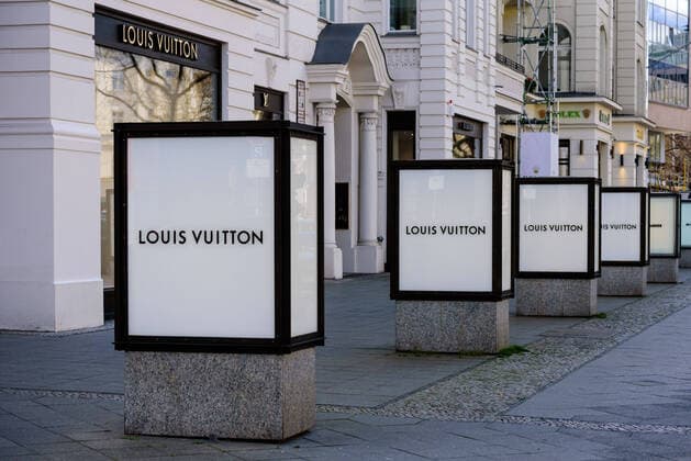 April 9, 2020, Berlin, Berlin, Germany: Advertising displays of the Louis Vuitton brand can be seen on the empty Kurfuerstendamm (Kudamm). German Federal Government and the heads of government of the federal states adopted guidelines for further restricting social contacts in the public sector in view of the corona epidemic in Germany. Currently, meetings of more than two people are not allowed. As far as possible, a minimum distance of 1.5 meters must be maintained. Violations are punishable by a fine. Berlin Germany - ZUMAs172 20200409_zap_s172_012 Copyright: xJanxScheunertx