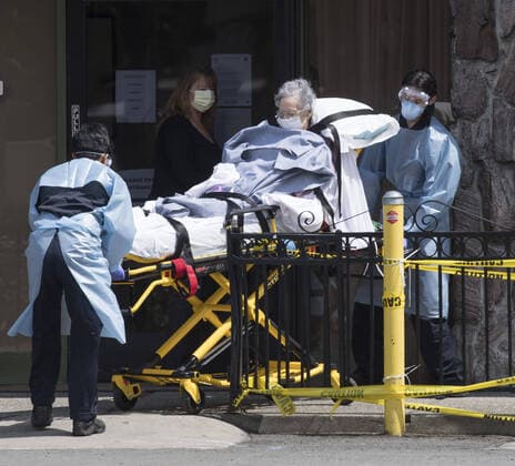 A patient is moved out of Gateway Care & Rehabillition Center, a skilled nursing facility in Hayward, California on Thursday, April 9, 2020. Thirty-five patients have tested positive for COVID-19 along with 24 staffers. Six patients have died.  SXP2020040905 TERRYxSCHMITT