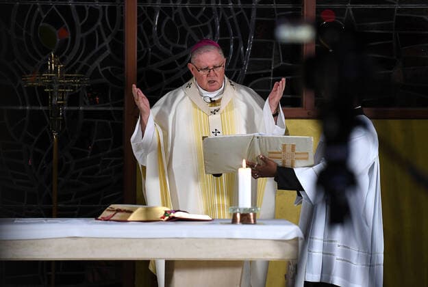 HOLY THURSDAY MASS COVID-19, Brisbane s Catholic archbishop Mark Coleridge delivers a Holy Thursday mass, which is being broadcasted online, to an empty chapel at St Vincent s Private Hospital in Brisbane, Thursday, April 9, 2020. The hospital has made preparations to take in coronavirus victims if needed. ( NO ARCHIVING, EDITORIAL USE ONLY, NO USE IN BOOKS WITHOUT CONSENT BRISBANE QLD AUSTRALIA  Copyright: xDANxPELEDx 20200409001462634386