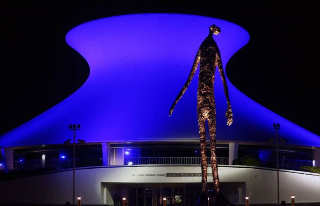 The Planetarium at the St. Louis Science Center in Forest Park is bathed in blue, beginning today in St. Louis Thursday, April 9, 2020. Many buildings in St. Louis are lit in blue in support of the LightItBlue campaign. The initiative, which originated in the United Kingdom, calls for buildings, bridges and landmarks with the capability to turn their lights blue as a show of gratitude to those health care professionals and essential workers caring for people on the front lines during the COVID-19 pandemic.  SLP2020040901 BILLxGREENBLATT