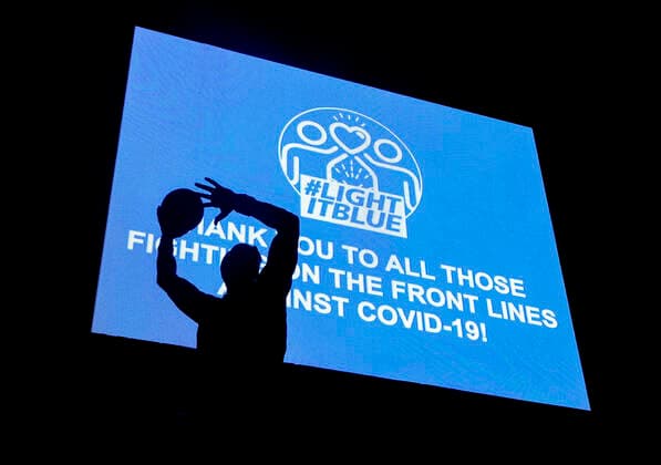 April 9, 2020, Los Angeles, California, U.S: The LIGHTITBLUE message: Ã¢â‚¬oeTHANK YOU TO ALL THOSE FIGHTING ON THE FRONT LINES AGAINST COVID-19!Ã¢â‚¬Â. is displayed on a screen at Staples Center in solidarity with the hospital workers and first responders fighting COVID-19, Thursday, April 9, 2020, in Los Angeles. Over 150 sites all over the U.S. lighted up blue tonight at 8pm local time in solidarity with the hospital workers and first responders fighting COVID-19. Los Angeles U.S. - ZUMAc68_ 20200409_zaf_c68_042 Copyright: xRingoxChiux
