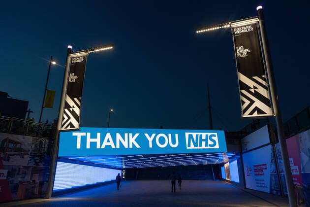 (200410) -- LONDON, April 10, 2020 (Xinhua) -- Photo taken on April 9, 2020 shows a message thanking NHS (National Health Service) workers in front of Wembley Stadium in northwest London, Britain. (Photo by Ray Tang Xinhua) BRITAIN-LONDON-COVID-19-NHS 