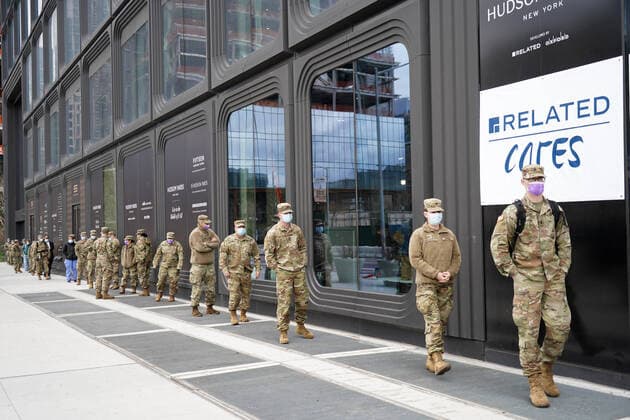 April 10, 2020, New York, New York, USA: Military and health care workers line up for lunch at the World Central Kitchen community kitchen, operated by Chef Jose Andres and Chefs for America, .The Javits Center,NYC.April 10, 2020.Photos by Sonia Moskowitz. New York USA - ZUMAm334 20200410_zep_m334_001 Copyright: xSoniaxMoskowitzxGordonx