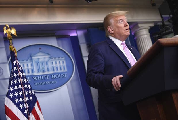 President Donald Trump speaks at a Coronavirus briefing at the White House on Friday, April 10, 2020, in Washington, DC. With the U.S. death toll from the coronavirus pandemic expected to peak over the weekend, most of the country will be firmly under stay-at-home orders on Easter Sunday.  WAS202041050111 KEVINxDIETSCH