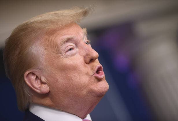 President Donald Trump speaks at a Coronavirus briefing at the White House on Friday, April 10, 2020, in Washington, DC.ÊWith the U.S. death toll from the coronavirus pandemic expected to peak over the weekend, most of the country will be firmly under stay-at-home orders on Easter Sunday.  WAS2020410502 KEVINxDIETSCH