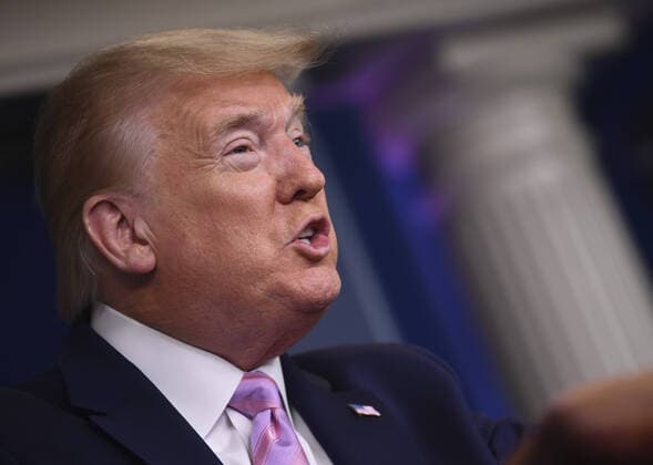 President Donald Trump speaks at a Coronavirus briefing at the White House on Friday, April 10, 2020, in Washington, DC. With the U.S. death toll from the coronavirus pandemic expected to peak over the weekend, most of the country will be firmly under stay-at-home orders on Easter Sunday.  WAS2020410520 KEVINxDIETSCH