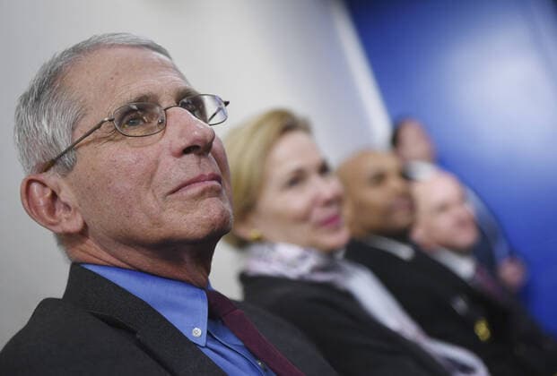Dr. Anthony Fauci, director of the National Institute of Allergy and Infectious Diseases, sits with other members of the task force at a Coronavirus briefing at the White House on Friday, April 10, 2020, in Washington, DC. With the U.S. death toll from the coronavirus pandemic expected to peak over the weekend, most of the country will be firmly under stay-at-home orders on Easter Sunday.  WAS202041050531 KEVINxDIETSCH