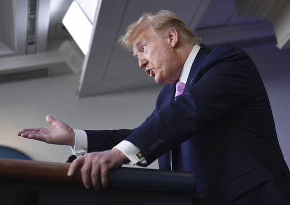 President Donald Trump speaks at a Coronavirus briefing at the White House on Friday, April 10, 2020, in Washington, DC. With the U.S. death toll from the coronavirus pandemic expected to peak over the weekend, most of the country will be firmly under stay-at-home orders on Easter Sunday.  WAS2020410536 KEVINxDIETSCH