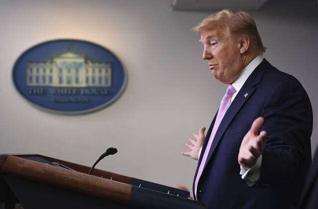 President Donald Trump speaks at a Coronavirus briefing at the White House on Friday, April 10, 2020, in Washington, DC. With the U.S. death toll from the coronavirus pandemic expected to peak over the weekend, most of the country will be firmly under stay-at-home orders on Easter Sunday.  WAS2020410537 KEVINxDIETSCH