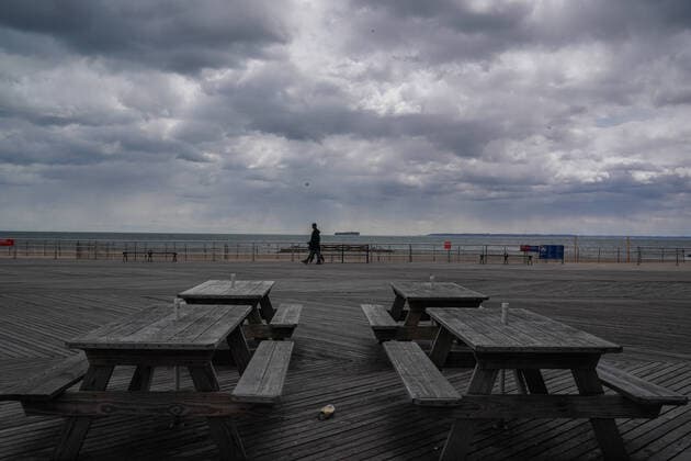 April 10, 2020, New York, NY, USA: A nearly deserted boardwalk in the Coney Island section of the Borough of Brooklyn on April 10, 2020 in New York. New York USA - ZUMAb148 20200410_zap_b148_079 Copyright: xBryanxSmithx