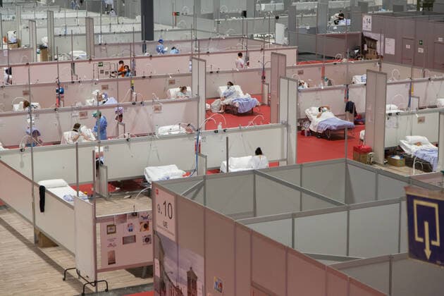 Spain: Field Hospital at IFEMA for COVID-19 patients The interior of the IFEMA Field Hospital in Madrid, with dozens of Covid-19 patients. Madrid Madrid Spain Copyright: FerxCapdeponxArroyo