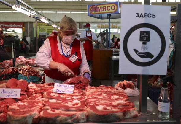 NOVOSIBIRSK, RUSSIA - APRIL 11, 2020: Meat for sale at the Oktyabrsky food market. Russian President Vladimir Putin has expanded non-working period till April 30, 2020 to prevent the spread of the novel coronavirus. Kirill Kukhmar TASS  TS0D5473
