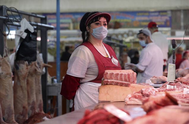 NOVOSIBIRSK, RUSSIA - APRIL 11, 2020: Meat for sale at the Oktyabrsky food market. Russian President Vladimir Putin has expanded non-working period till April 30, 2020 to prevent the spread of the novel coronavirus. Kirill Kukhmar TASS  TS0D547D