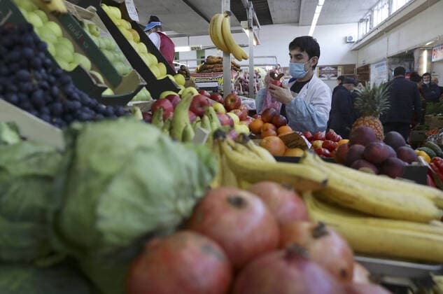 NOVOSIBIRSK, RUSSIA - APRIL 11, 2020: Fruits and vegetables for sale at the Oktyabrsky food market. Russian President Vladimir Putin has expanded non-working period till April 30, 2020 to prevent the spread of the novel coronavirus. Kirill Kukhmar TASS  TS0D5477