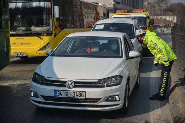 (200411) -- ISTANBUL, April 11, 2020 (Xinhua) -- A policeman inspects vehicles during a two-day curfew in Istanbul, Turkey, April 11, 2020. Turkey s total confirmed cases of COVID-19 climbed to 47,029, with 4,747 new patients reported in the last 24 hours, Turkish Health Minister Fahrettin Koca said Friday. Turkey has declared a two-day curfew for the weekend in 31 cities aiming to contain the increase in novel coronavirus cases, according to the Interior Ministry. (Photo by Mustafa Kaya Xinhua) TURKEY-ISTANBUL-COVID-19-CURFEW