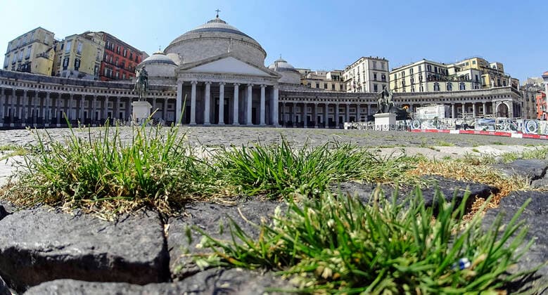 The grass grows in the cracks in the pavement of Plebiscito Square in front of Saint Francesco Da Paola Church, in the city center, after a month of lockdown. In Italy the lockdown still continue Government Decree declaring all of Italy a protected area to combat covid-19 - coronavirus infection, closing schools, public offices and shops.  Copyright: xSalvatorexLaportax xIPAx xKontrolabx