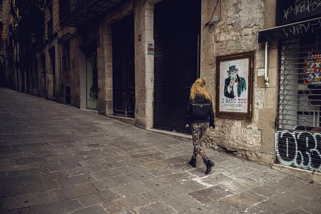 April 11, 2020: A commuter passes through deserted Gothic Quarter in Barcelona at the end of the first month of a nationwide lockdown due to the continuous spread of the virus. Spain registered less than 300 new fatalities totaling a death toll of over 16000 so far. - ZUMAo105 20200411_zap_o105_004 Copyright: xMatthiasxOesterlex