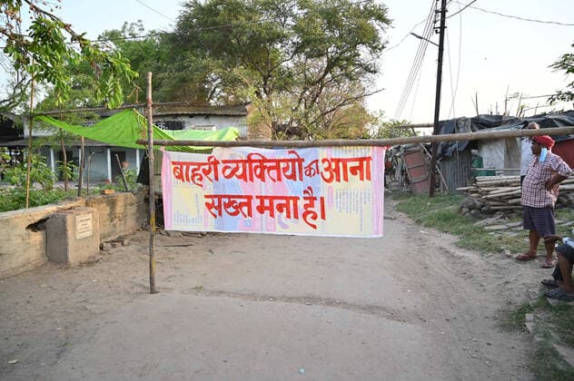 April 11, 2020, Prayagraj, Uttar Pradesh, India: Prayagraj: Local put a poster for Ã¢â‚¬oeNo Entry of OutsidersÃ¢â‚¬Â during a government-imposed nationwide lockdown as a preventive measure against the COVID-19 coronavirus, in Allahabad on Saturday, April 11,2020. Prayagraj India - ZUMAv115 20200411_zap_v115_030 Copyright: xPrabhatxKumarxVermax