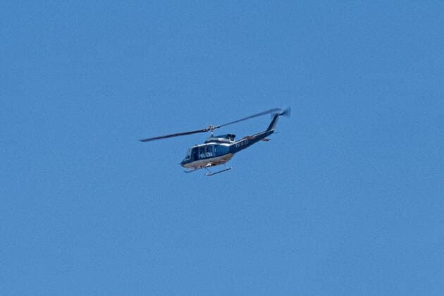 Milan, Coronavirus Covid emergency 19 - Checks to face the Easter exodus. In the photo: The police helicopter flies over Piazza della Repubblica. (Francesco Bozzo Fotogramma, Milan - 2020-04-11) p.s. la foto e utilizzabile nel rispetto del contesto in cui e stata scattata, e senza intento diffamatorio del decoro delle persone rappresentate  Copyright: xFrancescoxBozzox xFOTOGRAMMAx