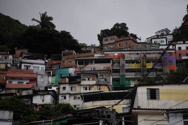 April 10, 2020: April 11.., 2020, Rio De Janeiro - ......Residents of the Santa Marta favela, in Botafogo, in the South Zone of Rio, start this Friday (10) to work on cleaning the areas of the community on their own. The objective is to prevent the lack of sanitary conditions from facilitating the expansion of the Covid-19 region. volunteers start the process with personal protective equipment (PPE). The Botafogo neighborhood, where the Santa Marta slum is located, had 36 confirmed cases of the new coronavirus as of this Sunday, according to the State Health Secretariat Panel. In the municipality of Rio alone, 1068 cases were recorded, according to the same panel. Cases across the state totaled 1394 cases..on April 10, 2020. - ZUMAt142 20200410_zap_t142_019 Copyright: xFabioxTeixeirax