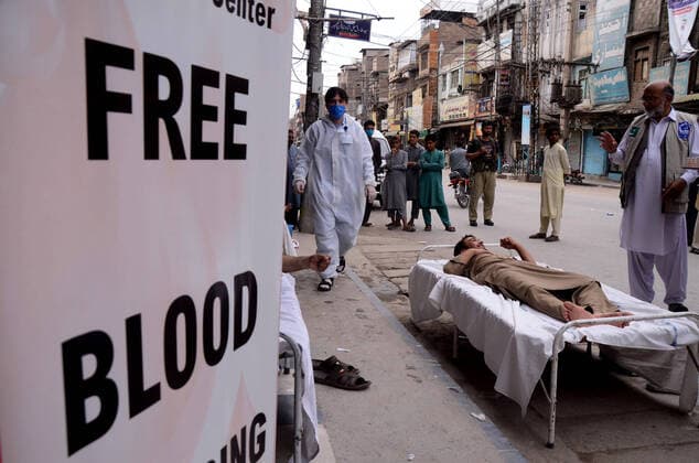 April 11, 2020: Peshawar, Pakistan. 11 April 2020. Volunteers donate blood for thalassemia patients in Peshawar. Restrictions imposed to curtail the spread of Coronavirus disease (COVID-19) in Pakistan have resulted in a shortage of blood donations, endangering the life of thalassemia-stricken patients in the country - ZUMAd99_ 20200411_zap_d99_004 Copyright: xHasnainxAlix