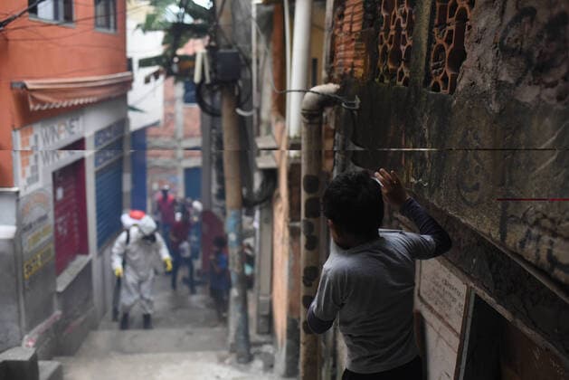 April 10, 2020: April 11.., 2020, Rio De Janeiro - ......Residents of the Santa Marta favela, in Botafogo, in the South Zone of Rio, start this Friday (10) to work on cleaning the areas of the community on their own. The objective is to prevent the lack of sanitary conditions from facilitating the expansion of the Covid-19 region. volunteers start the process with personal protective equipment (PPE). The Botafogo neighborhood, where the Santa Marta slum is located, had 36 confirmed cases of the new coronavirus as of this Sunday, according to the State Health Secretariat Panel. In the municipality of Rio alone, 1068 cases were recorded, according to the same panel. Cases across the state totaled 1394 cases..on April 10, 2020. - ZUMAt142 20200410_zap_t142_023 Copyright: xFabioxTeixeirax