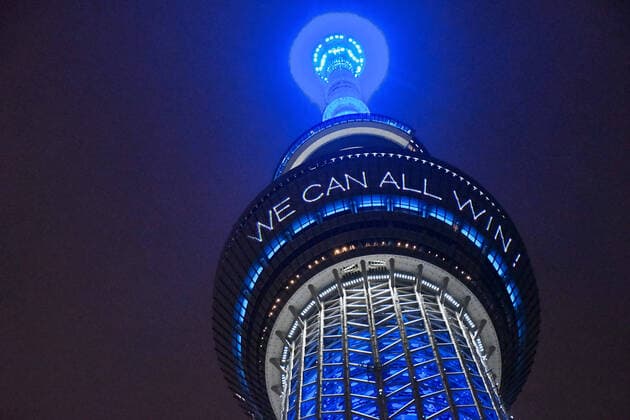 A message Together we can all win is displayed at the Tokyo Skytree in Tokyo, Japan on Saturday evening, April 11, 2020.  TKP2020041121 KEIZOxMORI