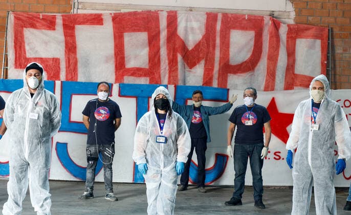 April 11, 2020, Naples, Campania, Italy: Italy, 11 04 2020, Naples, Scampia district, a group of associations from the northern area of the Neapolitan city with their volunteers, to face the poverty of families in the period of the quarantine for the pandemic for the covid-19 virus, go around the houses delivering basic necessities for Easter. Naples Italy - ZUMAs236 20200411_zap_s236_027 Copyright: xFabioxSassox