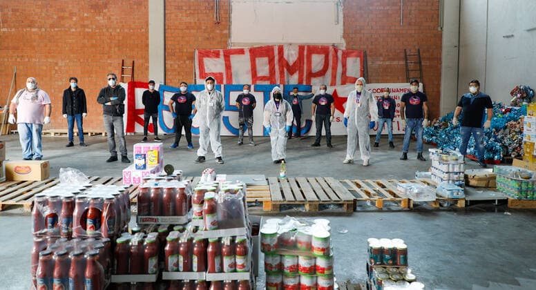 April 11, 2020, Naples, Campania, Italy: Italy, 11 04 2020, Naples, Scampia district, a group of associations from the northern area of the Neapolitan city with their volunteers, to face the poverty of families in the period of the quarantine for the pandemic for the covid-19 virus, go around the houses delivering basic necessities for Easter. Naples Italy - ZUMAs236 20200411_zap_s236_029 Copyright: xFabioxSassox