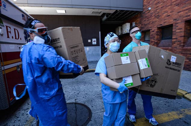 April 11, 2020, New York Bronx, USA: Nurse receives donation of masks from China. The Bronx heavily minority borough has the highest per-case fatality rate in NYC. The COVID-19 death toll in the NYC is 7,844 and 170,512 confirmed cases. 04 11 20. New York. New York Bronx. USA - ZUMAs252 20200411_znp_s252_005 Copyright: xMarcusxSantosx