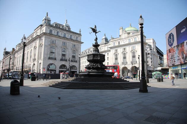 Day Nineteen of Lockdown in London. An almost deserted Piccadilly Circus in London on Easter Saturday. It is the first public holiday of the year, and many people enjoy the long weekend by going out and about or on holiday, but this year the country is on lockdown due to the COVID-19 Coronavirus pandemic. People are not allowed to leave home except for minimal food shopping, medical treatment, exercise - once a day, and essential work. COVID-19 Coronavirus lockdown, London, UK, on April 11, 2020 