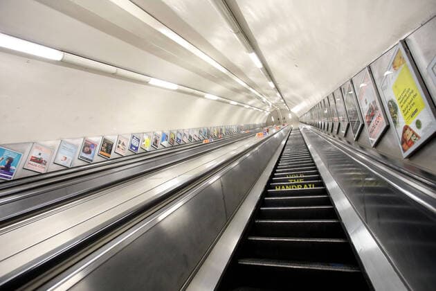 Day Nineteen of Lockdown in London. The Underground escalators are empty at Green Park in London on Easter Saturday. It is the first public holiday of the year, and many people enjoy the long weekend by going out and about or on holiday, but this year the country is on lockdown due to the COVID-19 Coronavirus pandemic. People are not allowed to leave home except for minimal food shopping, medical treatment, exercise - once a day, and essential work. COVID-19 Coronavirus lockdown, London, UK, on April 11, 2020 