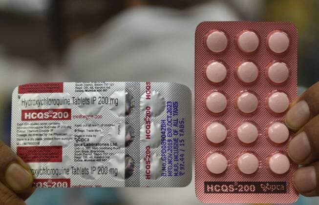 KOLKATA, INDIA APRIL 11: An employee at a medical store holds a strip of hydroxychloroquine (HCQ), on day eight of the 21 day nationwide lockdown to limit the spread of coronavirus, on April 11, 2020 in Kolkata, India. (Photo by Samir Jana Hindustan Times ) India Goes Into 21 Day Lockdown Due To Coronavirus COVID 19