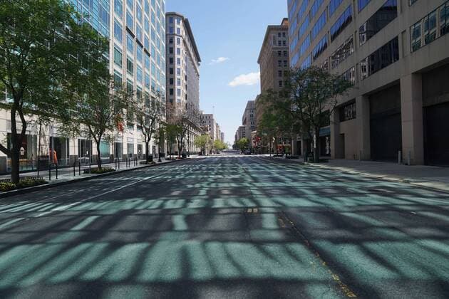 (200411) -- WASHINGTON, April 11, 2020 -- An empty street is seen in Washington D.C., the United States, April 11, 2020. The total number of deaths due to COVID-19 in the United States topped 20,000 Saturday afternoon, according to data compiled by the Center for Systems Science and Engineering (CSSE) at Johns Hopkins University. ) U.S.-WASHINGTON D.C.-COVID-19-DEATH TOLL LiuxJie 