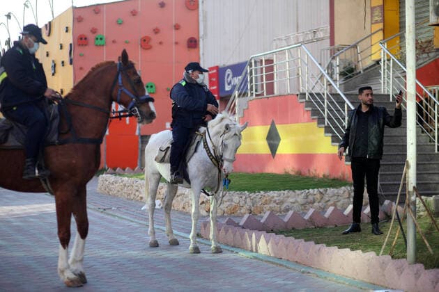 April 11, 2020, Gaza City, Gaza Strip, Palestinian Territory: Palestinian policemen stand guard on the streets as a preventive measure amid fears of the spread of the coronavirus disease (COVID-19), in Gaza city, on April 11, 2020 Gaza City Palestinian Territory - ZUMAap3_ 20200411_zaf_ap3_102 Copyright: xMahmoudxAjjourx