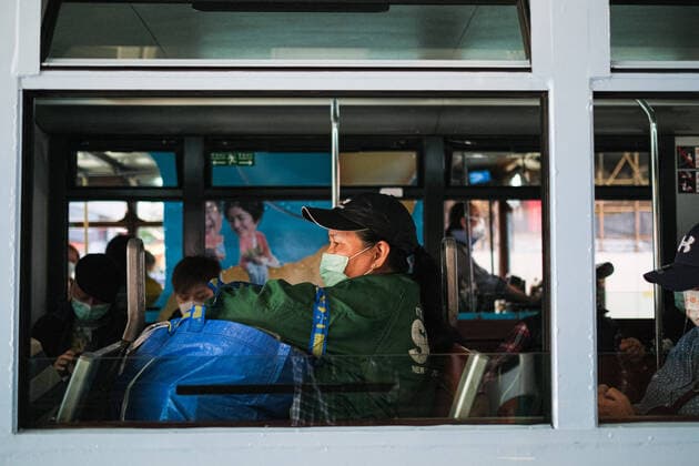 April 12, 2020, Hong Kong, China: People wear surgical face mask and commute on tram. Corona Virus (Covid19) cases in Hong Kong have reached over 1,000 on Saturday as authorities urged the public to stay at home during the long Easter weekend. Hong Kong China - ZUMAt141 20200412_zap_t141_002 Copyright: xKeithxTsujix