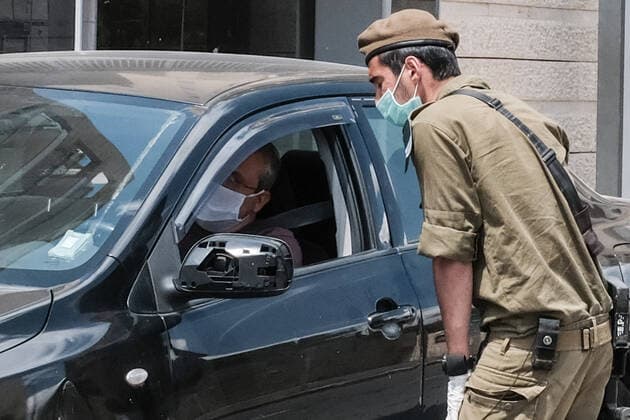 April 12, 2020, Jerusalem, Israel: The Israel Police, reinforced by IDF soldiers, enforces a newly imposed full closure on Givat Mordechai neighborhood, one of 17 predominantly Jewish religious neighborhoods in Jerusalem, with increased coronavirus infections. The number of confirmed COVID-19 cases in Israel rises to 10,878, with 103 deaths. Jerusalem Israel - ZUMAa126 20200412_zap_a126_012 Copyright: xNirxAlonx