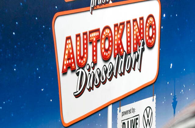 12.04.2020, Katholische Ostermesse im Autokino Düsseldorf, Logo des Autokinos. 12.04.2020, Katholische Ostermesse im Autokino Düsseldorf 12.04.2020, Katholische Ostermesse im Autokino Düsseldorf