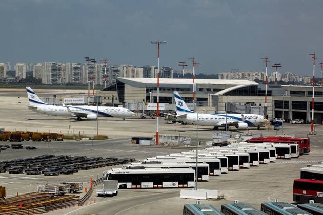 (200412) -- TEL AVIV, April 12, 2020 (Xinhua) -- Photo taken on April 12, 2020 shows airplanes at Ben-Gurion International Airport near Israeli city of Tel Aviv amid the coronavirus pandemic. Israeli Prime Minister Benjamin Netanyahu ordered on Saturday to stop all flights to the country after passengers entered Israel without health supervision amid the novel coronavirus pandemic. According to the Israeli government s instructions, anyone who lands in the country must immediately enter a 14-day quarantine. (Photo by Gil Cohen Magen Xinhua) MIDEAST-TEL AVIV-COVID-19-FLIGHT STOP 