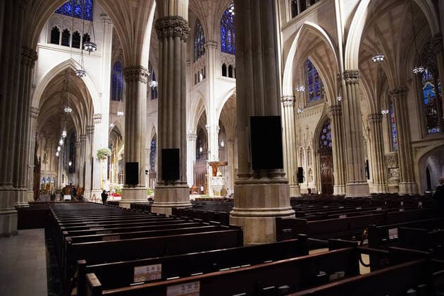 Church pews are empty of parishioners due to the Coronavirus pandemic while Cardinal Timothy Dolan offers Easter Sunday Mass at St. Patrick s Cathedral in New York City on Sunday, April 12, 2020. For the first time, the United States government and President Trump have declared all 50 states a major disaster for the same event.  NYP20200412109 JOHNxANGELILLO