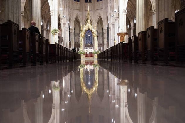 Church pews are empty of parishioners due to the Coronavirus pandemic while Cardinal Timothy Dolan offers Easter Sunday Mass at St. Patrick s Cathedral in New York City on Sunday, April 12, 2020. For the first time, the United States government and President Trump have declared all 50 states a major disaster for the same event.  NYP20200412110 JOHNxANGELILLO