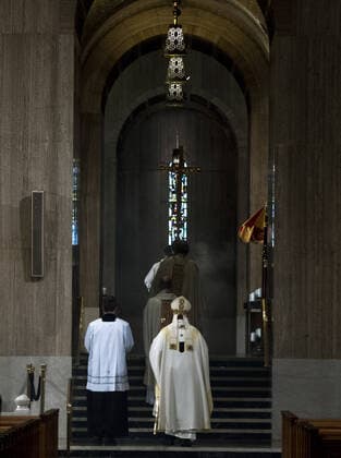 Archbishop of Washington Wilton Daniel Gregory departs the alter after holding an Easter mass to a virtual congregation at the Basilica of the National Shrine of the Immaculate Conception, in Washington, DC, Sunday, April 12, 2020. The Archdiocese of Washington DC closed the Basilica to the public and live-streamed the mass due to the coronavirus COVID-19 pandemic.  WAP20200412310 KEVINxDIETSCH