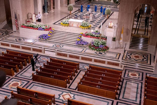 The Basilica of the National Shrine of the Immaculate Conception holds a live-stream Easter mass, in Washington, DC, Sunday, April 12, 2020. The Archdiocese of Washington DC closed the Basilica to the public and live-streamed the mass due to the coronavirus COVID-19 pandemic.  WAP20200412317 KEVINxDIETSCH