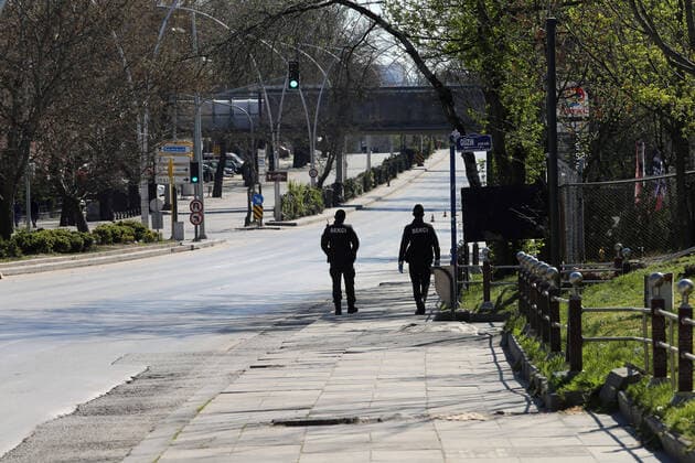 (200412) -- ANKARA, April 12, 2020 (Xinhua) -- Security personnel patrol on a street under a curfew in Ankara, Turkey, on April 12, 2020. The total number of COVID-19 cases in Turkey has risen to 56,956 with 4,789 new ones reported in the last 24 hours, Turkish Health Minister Fahrettin Koca said Sunday. (Photo by Mustafa Kaya Xinhua) TURKEY-ANKARA-COVID-19-CURFEW 