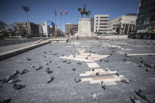 Pigeons around the Ataturk Statue on the deserted Ulus Square in Ankara,in Ankara, on April 12, 2020, during the 48-hour curfew imposed by the government to stem the spread of the novel coronavirus (COVID-19). Turkey has confirmed 1,198 deaths and 56,956 positive cases of the coronavirus infection in the country. ( Copyright: AbdurrahmanxAntakyalix-xDepoxPho 16718756